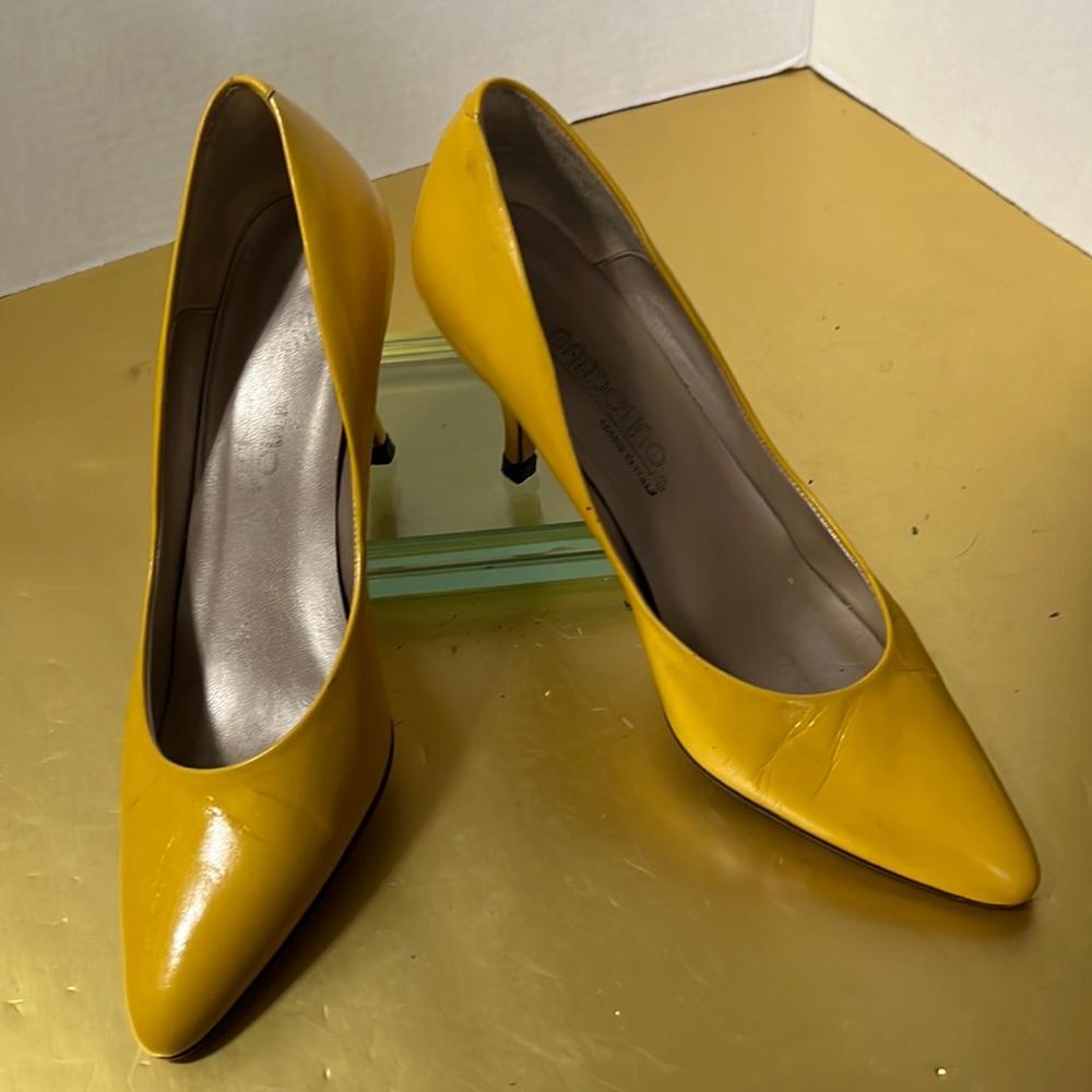 Bright yellow leather high heel pumps by Bandolino
